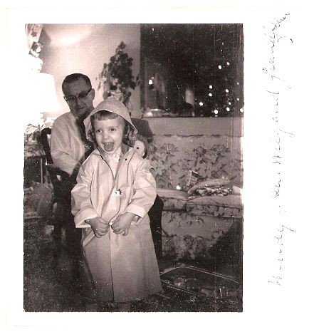 1963.. - daughter Wendy, father Wilfred - the yellow raincoat!.jpg